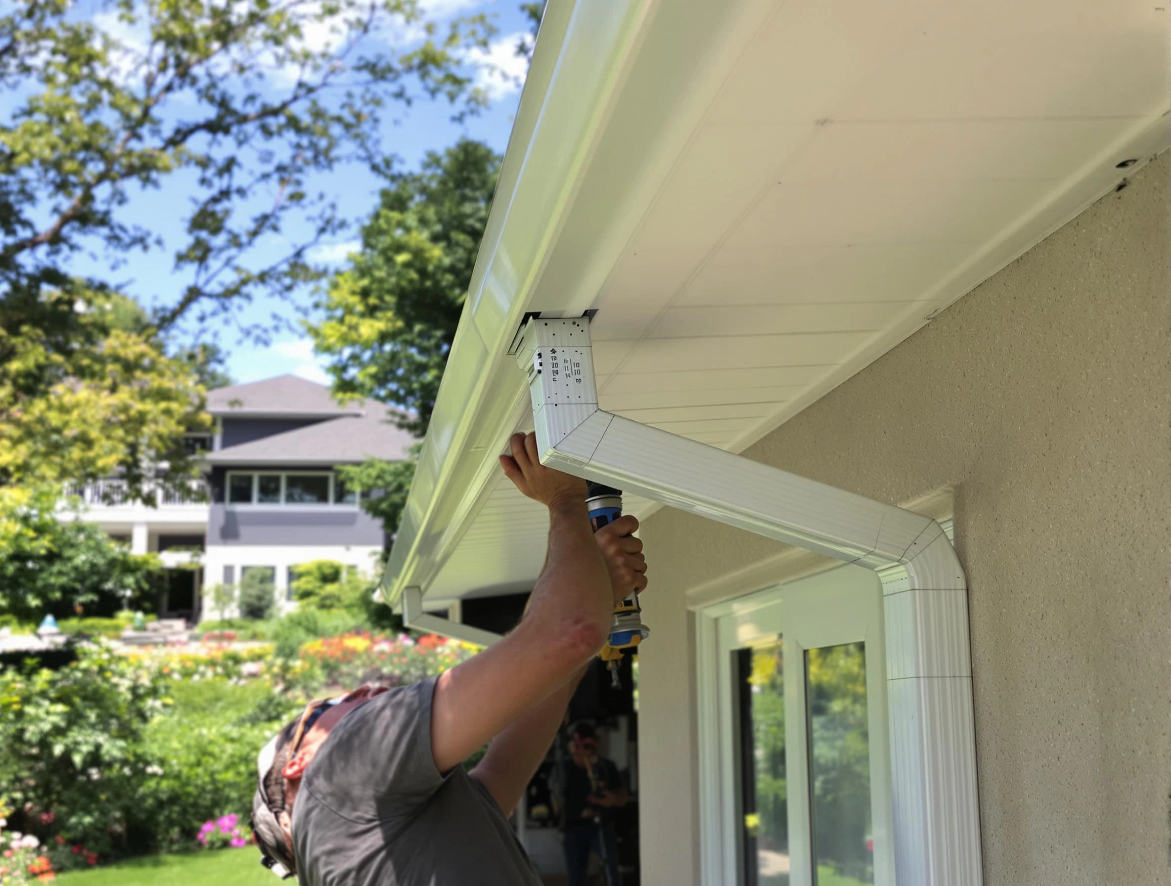 Cuyahoga Falls Roofing Company technicians performing gutter installation in Cuyahoga Falls, OH