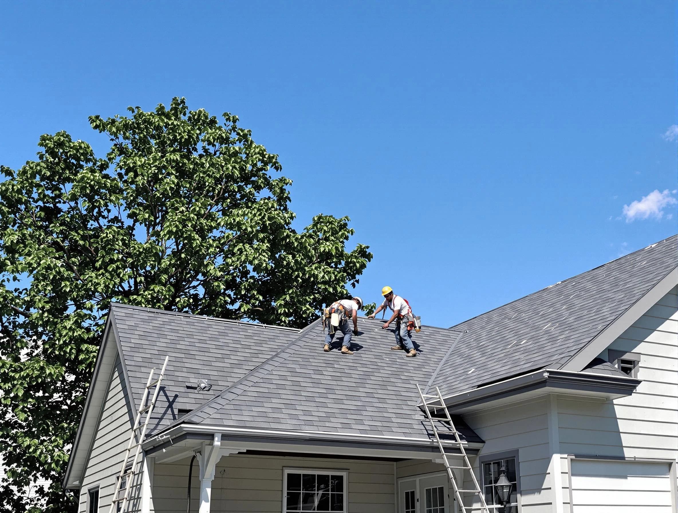 Cuyahoga Falls Roofing Company crew finalizing a roof installation in Cuyahoga Falls, OH