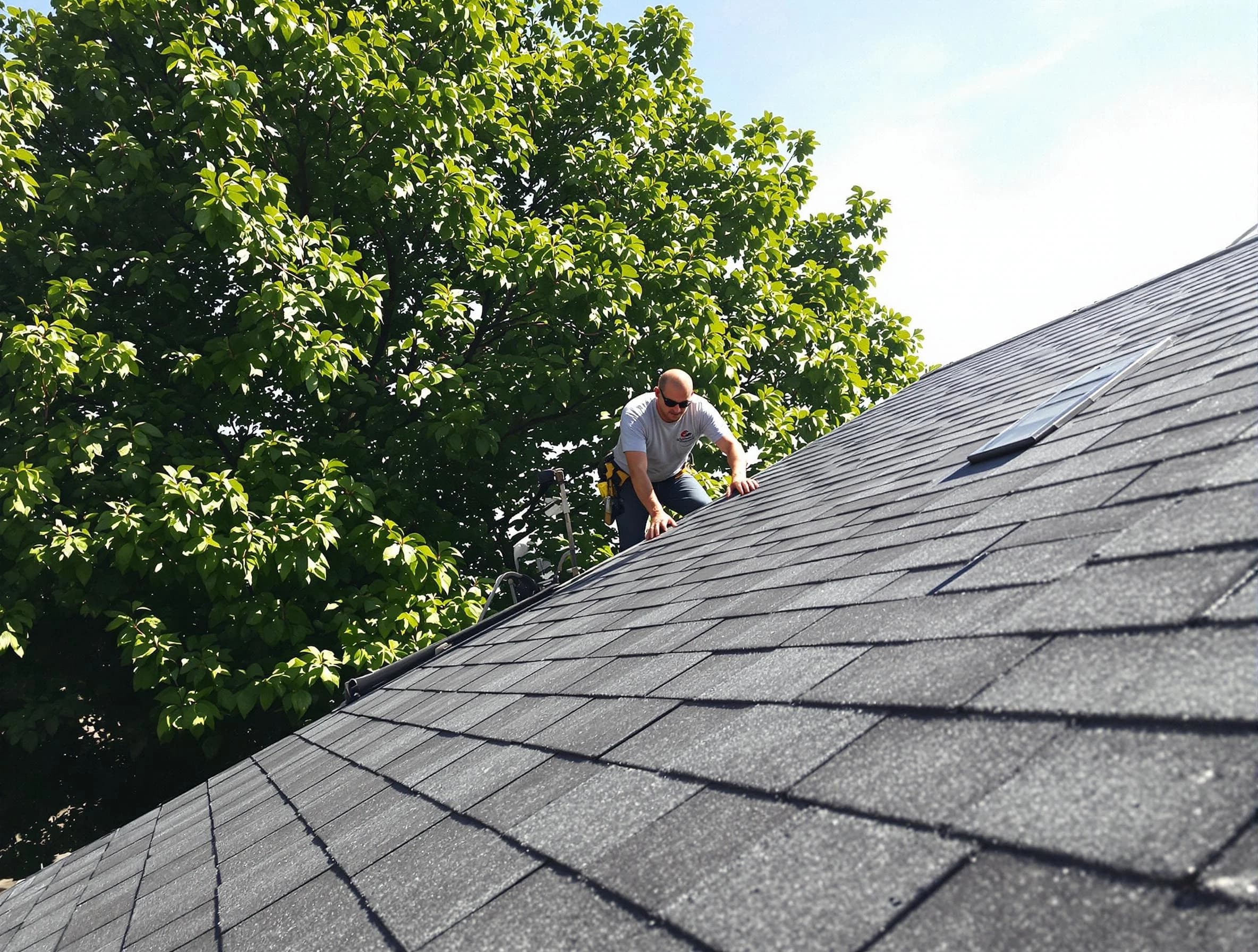 Certified roofers from Cuyahoga Falls Roofing Company working in Cuyahoga Falls, OH